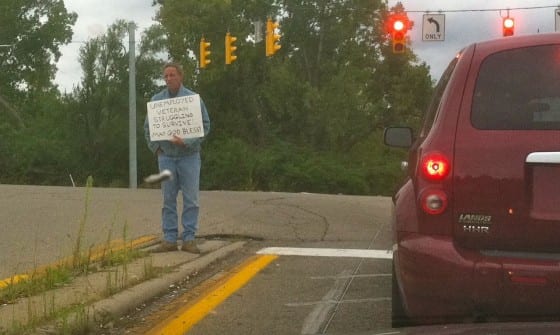 Panhandling with a sign in Riverside