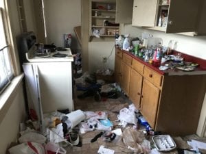 A trashed kitchen serves as an indication that menal health intervntion might be a good idea