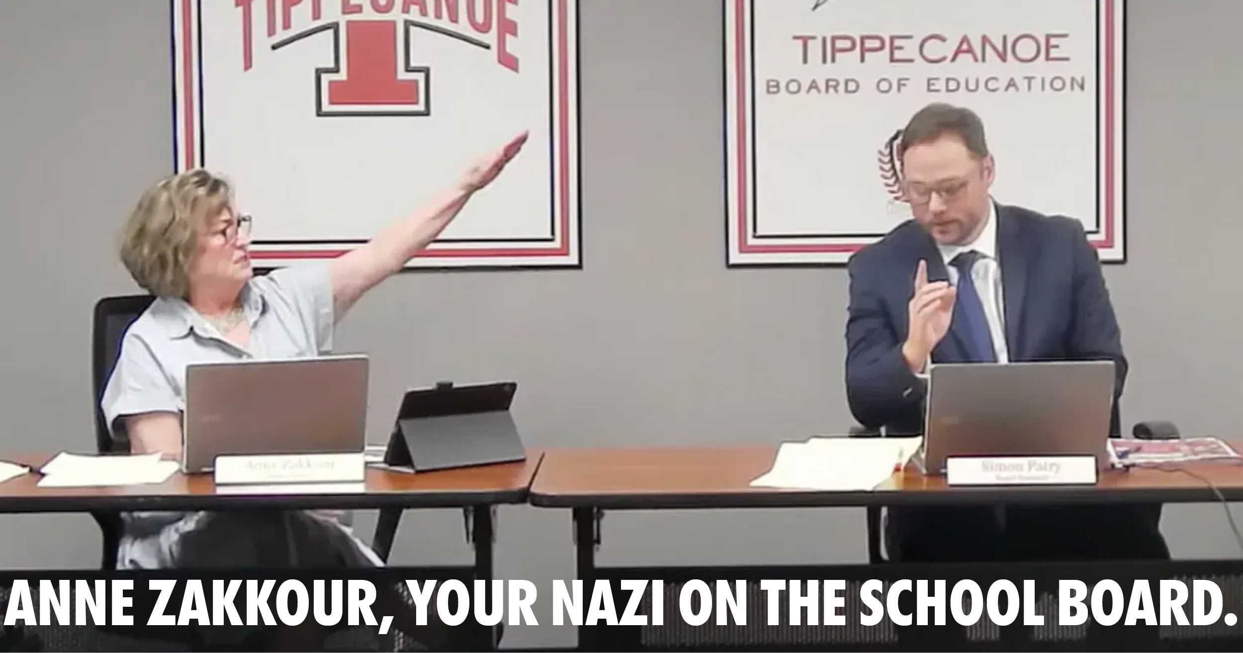 Tipp City School Board Member Anne Zakkour gives a Nazi salute and Seig Heil to the board president who resigns