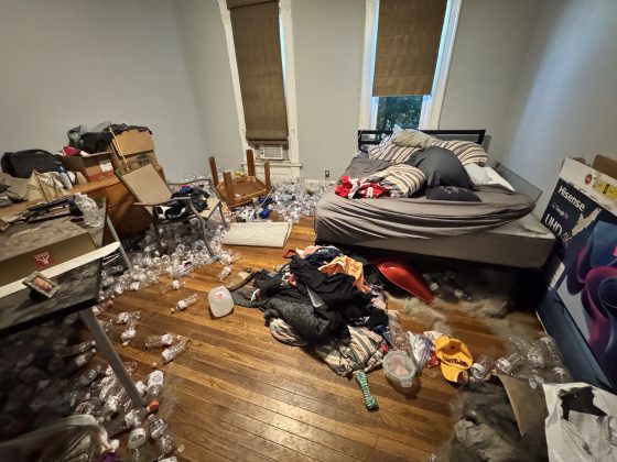 the bedroom of the mentally incompetent veteran. Yes- that's mounds of dog hair at the foot of the bed